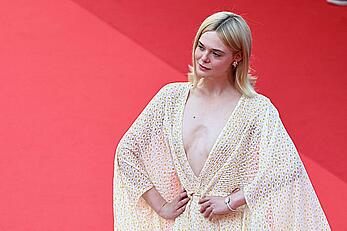 Elle Fanning in see through dress at closing ceremony red carpet of the 77th annual Cannes Film Festival