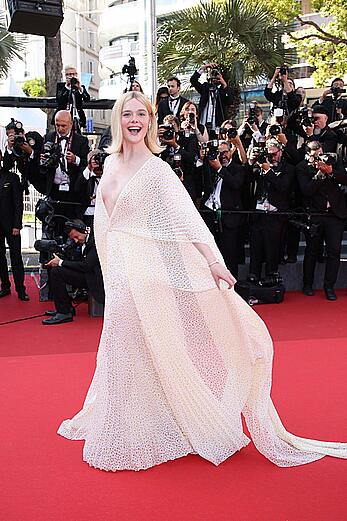 Elle Fanning in see through dress at closing ceremony red carpet of the 77th annual Cannes Film Festival