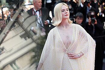 Elle Fanning in see through dress at closing ceremony red carpet of the 77th annual Cannes Film Festival