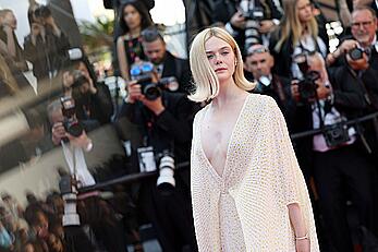 Elle Fanning in see through dress at closing ceremony red carpet of the 77th annual Cannes Film Festival