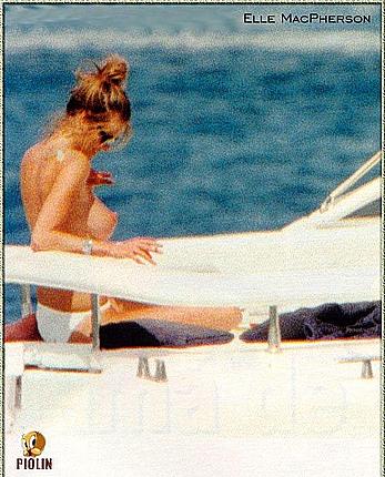 Elle Macpherson topless on a yacht paparazzi photos