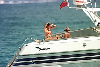 Elle Macpherson topless on a yacht