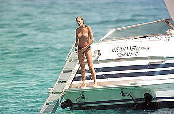 Elle Macpherson topless on a yacht