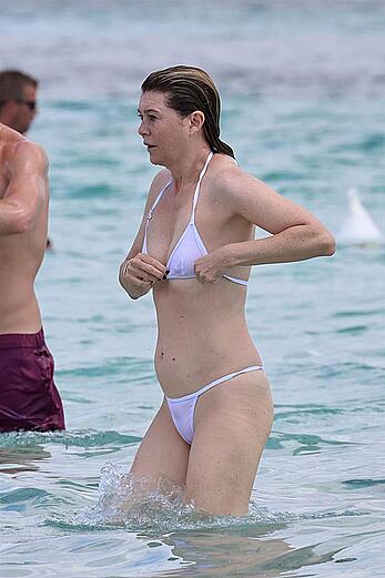 Ellen Pompeo in wet see through bikini at the beach in Sardinia