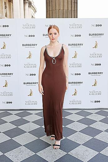 English actress Ellie Bamber pokies in tight dress at The Alchemist's Feast in London