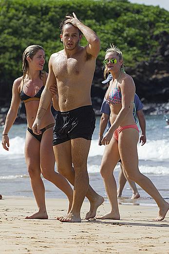 Emily Bett Rickards in bikini at the beach in Maui