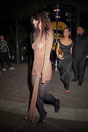 Emily Ratajkowski braless in see through dress at Odell Beckham Jr.'s NYC birthday festivities