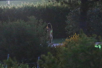 Emily Ratajkowski nude from behind on set of Welcome Home in Italy