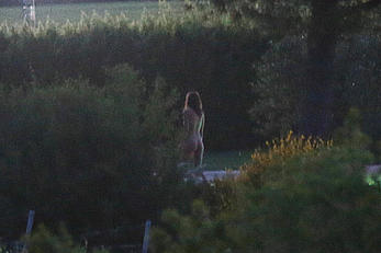 Emily Ratajkowski nude from behind on set of Welcome Home in Italy