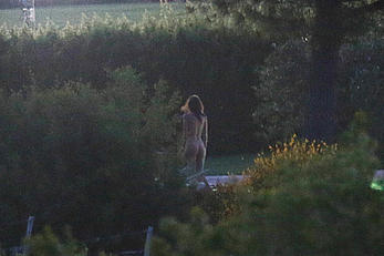 Emily Ratajkowski nude from behind on set of Welcome Home in Italy