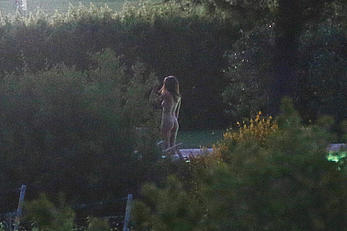 Emily Ratajkowski nude from behind on set of Welcome Home in Italy