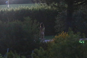 Emily Ratajkowski nude from behind on set of Welcome Home in Italy