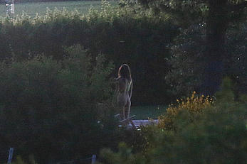 Emily Ratajkowski nude from behind on set of Welcome Home in Italy