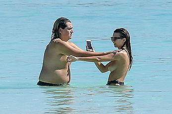 Busty Emily Ratajkowski topless on a beach in Cancun