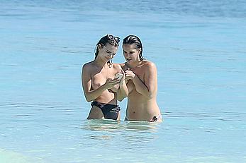 Busty Emily Ratajkowski topless on a beach in Cancun