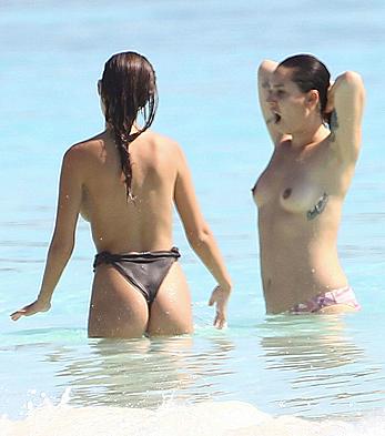 Busty Emily Ratajkowski topless on a beach in Cancun