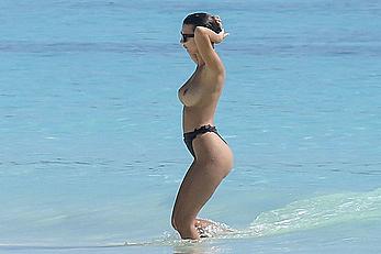 Busty Emily Ratajkowski topless on a beach in Cancun