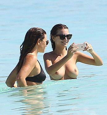 Busty Emily Ratajkowski topless on a beach in Cancun