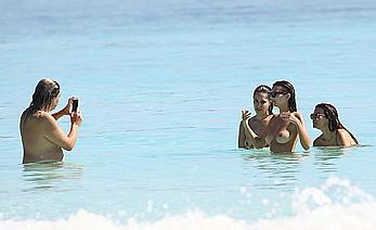 Busty Emily Ratajkowski topless on a beach in Cancun