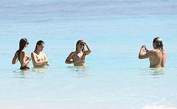 Busty Emily Ratajkowski topless on a beach in Cancun