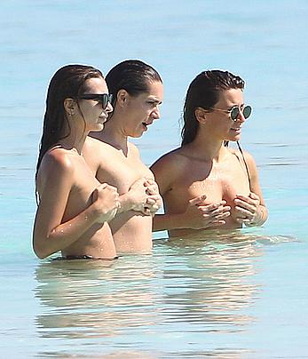 Busty Emily Ratajkowski topless on a beach in Cancun