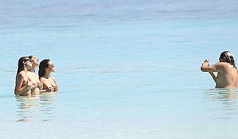 Busty Emily Ratajkowski topless on a beach in Cancun