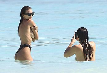 Busty Emily Ratajkowski topless on a beach in Cancun