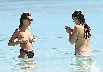 Busty Emily Ratajkowski topless on a beach in Cancun