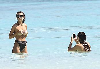 Busty Emily Ratajkowski topless on a beach in Cancun