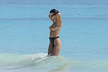 Busty Emily Ratajkowski topless on a beach in Cancun