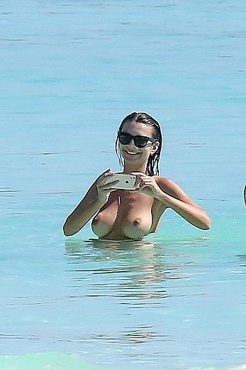 Busty Emily Ratajkowski topless on a beach in Cancun