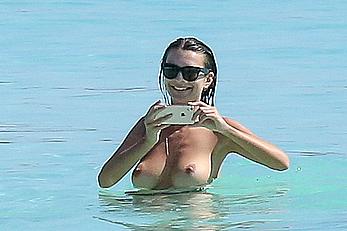 Busty Emily Ratajkowski topless on a beach in Cancun