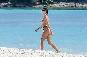 Busty Emily Ratajkowski topless on a beach in Cancun