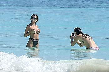 Busty Emily Ratajkowski topless on a beach in Cancun