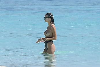 Busty Emily Ratajkowski topless on a beach in Cancun