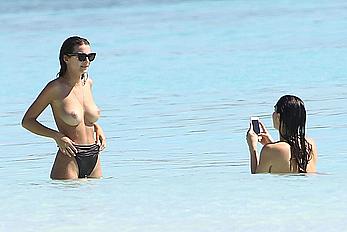 Busty Emily Ratajkowski topless on a beach in Cancun