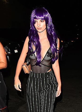 Emily Ratajkowski in a see through bodysuit with pasties at Halloween party