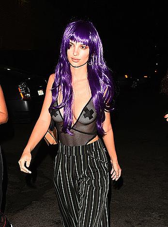 Emily Ratajkowski in a see through bodysuit with pasties at Halloween party