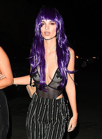 Emily Ratajkowski in a see through bodysuit with pasties at Halloween party