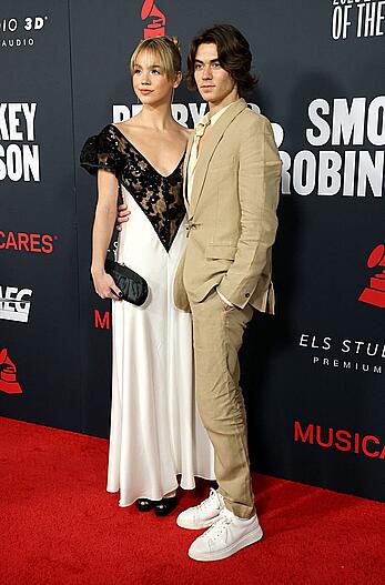 Emma Brooks braless in see throug dress at MusiCares Persons of The Year Gala paparazzi shots