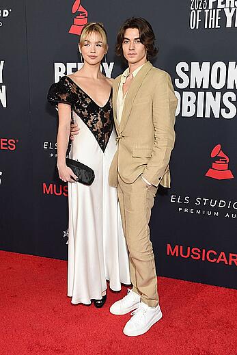 Emma Brooks braless in see throug dress at MusiCares Persons of The Year Gala paparazzi shots