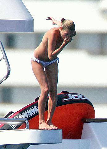 Kate Moss caught topless on a yacht