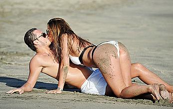 Ferne McCann sexy in white bikini on the beach while in Tenerife