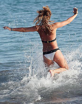 Ferne McCann sexy in white bikini on the beach while in Tenerife