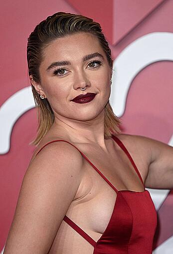 Florence Pugh seideboob in red dress at The Fashion Awards 2022 in London