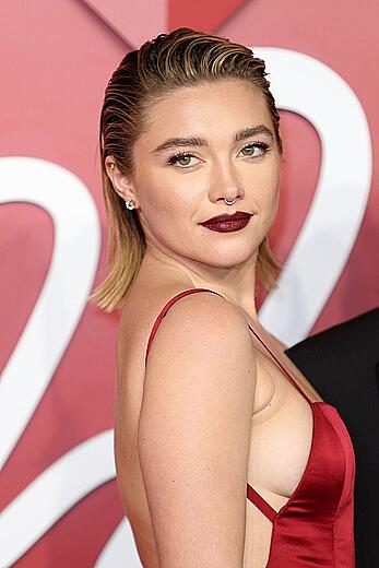 Florence Pugh seideboob in red dress at The Fashion Awards 2022 in London