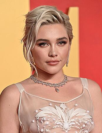 Florence Pugh braless in see through top at the Vanity Fair Oscar Party