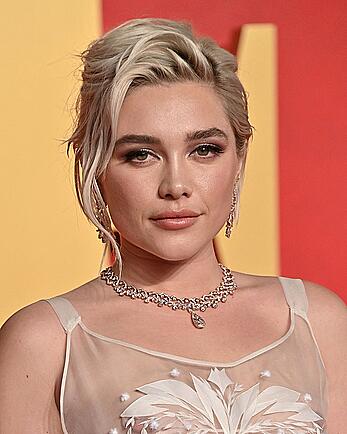 Florence Pugh braless in see through top at the Vanity Fair Oscar Party