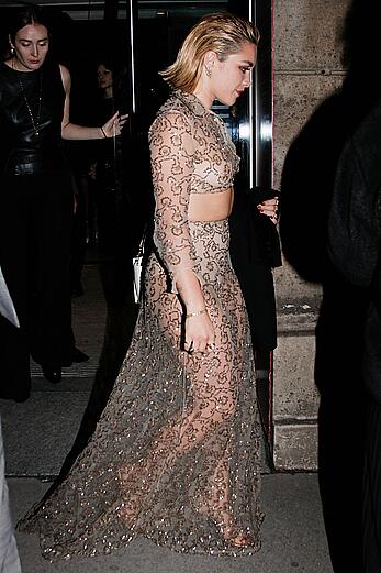 Florence Pugh braless in see through dress at the Valentino Dinner in Paris