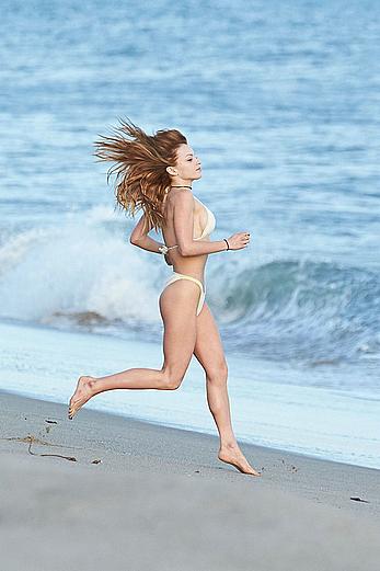 Francesca Eastwood topless on the beach in Malibu